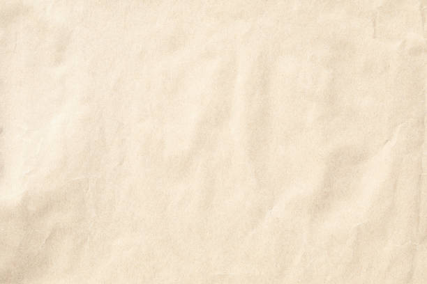 istock Crumpled brown paper wallpaper texture 1434135563