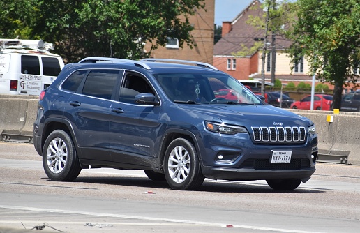 Blue Jeep Cherokee cruising on I-45 in Houston, Texas 2022