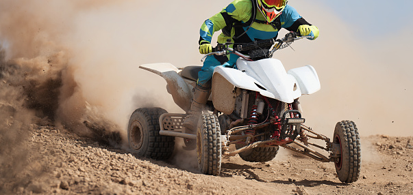 ATV Rider in the 4x4 quad bike race, extreme sports rally