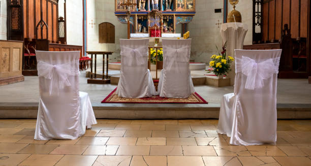 istock White wedding chairs in a church 1434139618