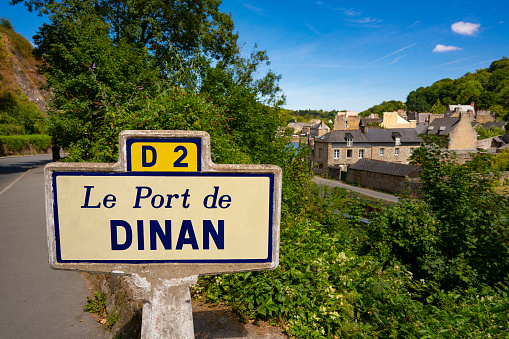 Dinan Port tiles old road sign french Bretagne Brittany picturesque town in France. Walled Breton town in the Côtes-d'Armor