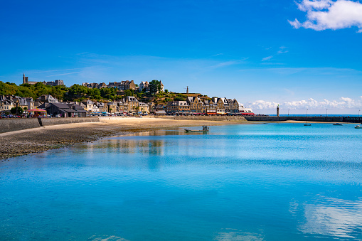 Sunny aerial view of beautiful walled port city of Saint-Malo at high tide, Brittany, France