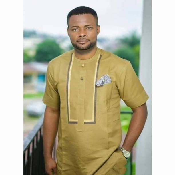 istock African Man dressed in African Fabric 1434144983