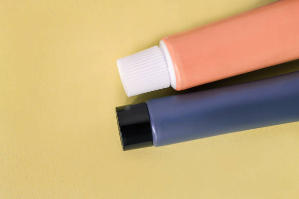 istock Cosmetic tubes on yellow 1434145128
