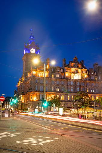 Edinburgh sunset night with cars painted light lines in Princess street at the capital city of Scotland UK United Kingdom