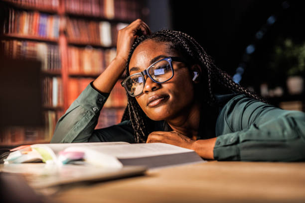 Free Stock Photo of College student reading book for exam | Download ...