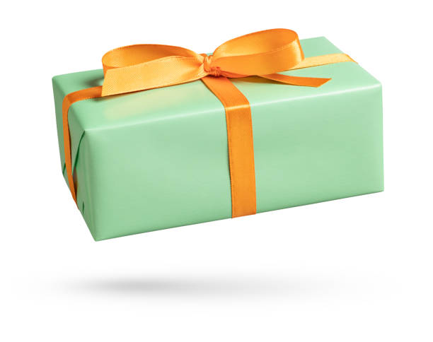 istock Green gift box with orange ribbon on white 1434151571