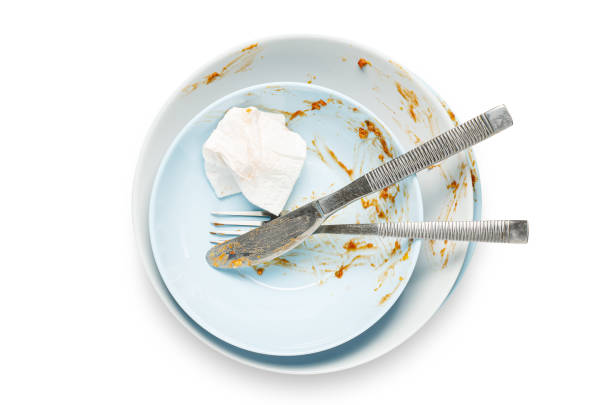 istock Dirty plates with leftover sauce. Isolated on a white background. 1434151624