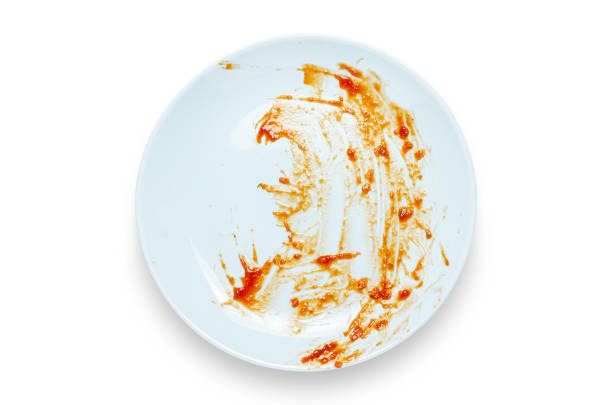 istock A dirty plate with leftover sauce. Isolated on a white background. 1434151625