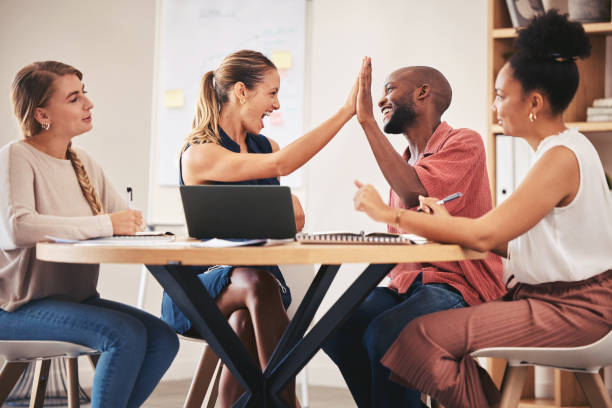 istock High five, success and teamwork with business people in collaboration in diversity office. Happy, smile and excited digital marketing workers with partnership sale, b2b growth deal and brand strategy 1434151732