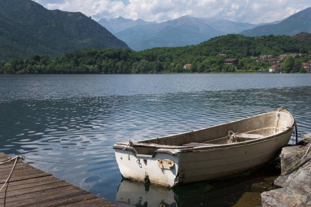 Rowing boat docked on the Avigliana Lake