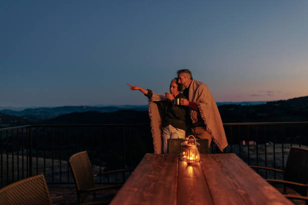 istock Senior couple outdoors in autumn night. 1434153404