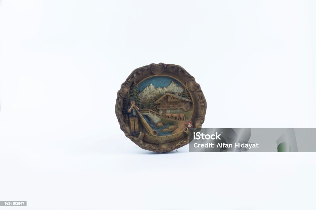 Banjarnegara, October 09 2022. Wall display 3d rounded souvenir switzerland isolated at white background Badge Stock Photo
