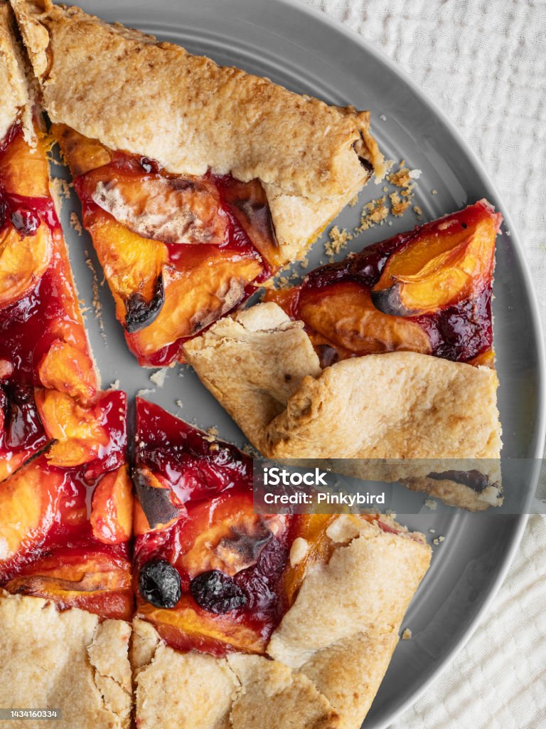 Galette, Peach galette, Homemade peach galette Afternoon Tea, Backgrounds, Baked, Baked Pastry Item, Bakery, Food and drink, Food, Dessert - Sweet Food, fresh fruit, Berry, Peach, Nectarine, Sweet Pie, Cake, Galette, Tart - Dessert Afternoon Tea Stock Photo
