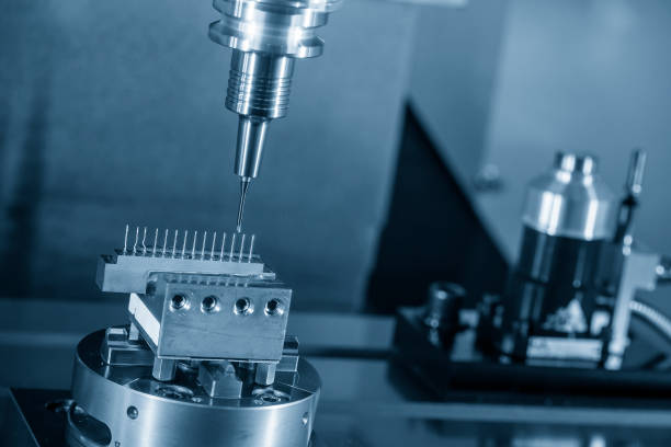 istock The CNC milling machine cutting the copper electrode parts with solid ball end mill. 1434160797