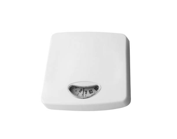 istock Dieting concept with scales isolated on the white 1434161401