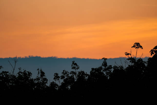 istock Sunset sky and clear clouds over hill background 1434161574