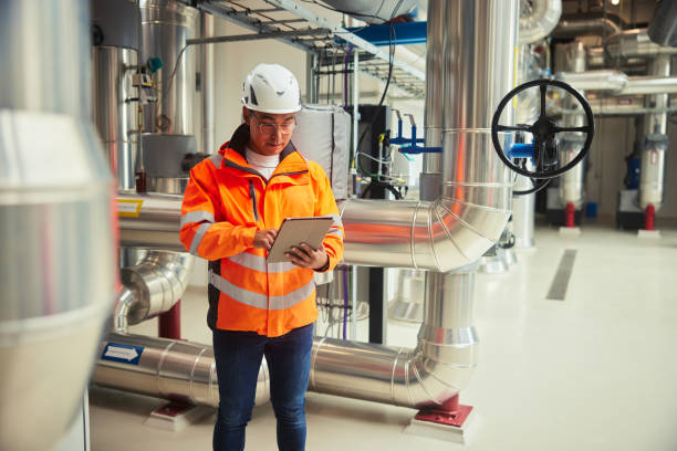istock Engineer working with a tablet in a power station 1434163284