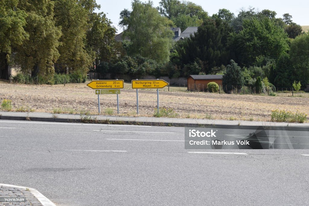 intersection with a road sign Rhineland-Palatinate, Eifel Color Image Stock Photo