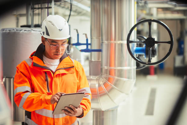 istock Male engineer working in a power station with a digital tablet 1434163737