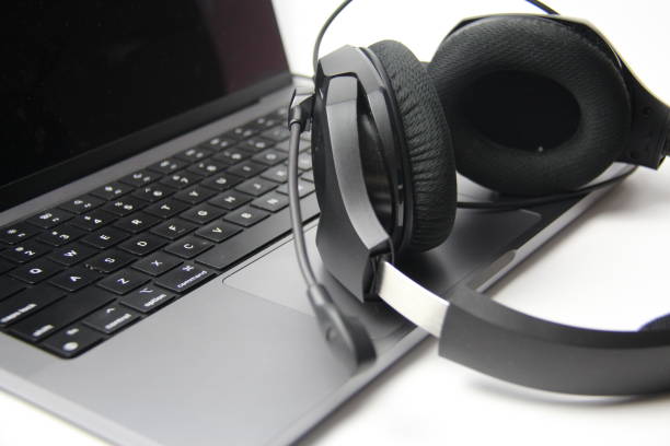 istock Headphones and a laptop. 1434165654