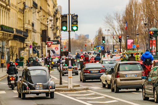 Urban day scene at avenue of historic center of paris, france