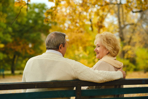 istock Active seniors on a walk in autumn forest 1434173741