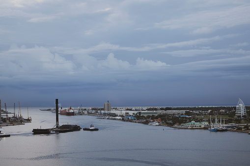 A SpaceX Falcon 9 rocket booster returns to Port Canaveral on a SpaceX barge several days after launching a satellite into space. (Port Canaveral, Florida - Octboer 13, 2022)