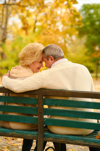 istock Active seniors on a walk in autumn forest 1434175543
