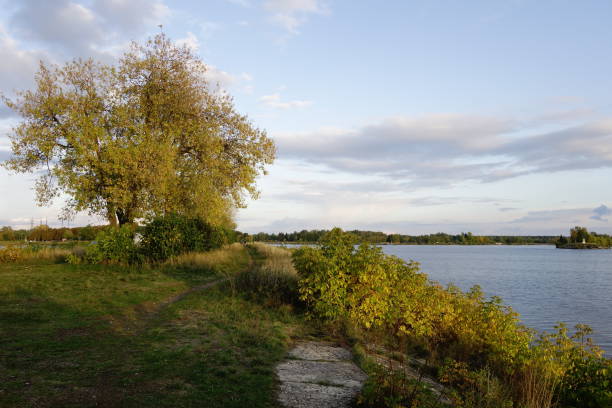 istock A scenic walk trail past the water in autumn 1434175747