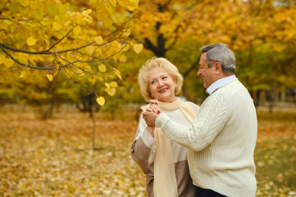 istock Active seniors on a walk in autumn forest 1434176460