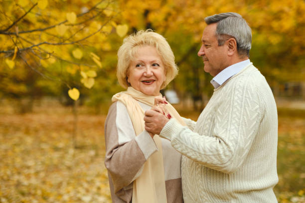 istock Active seniors on a walk in autumn forest 1434177739