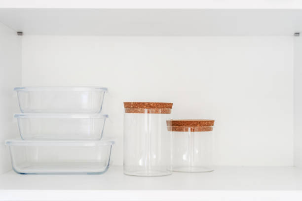 istock food containers and glass jars on white shelf at kitchen 1434178760