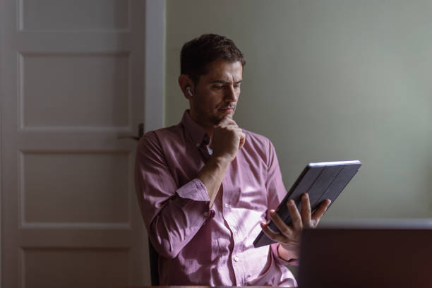 istock Middle-age man working at home 1434179147