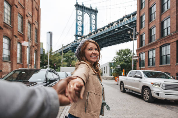 istock Couple walking down the streets discovering New York 1434180467
