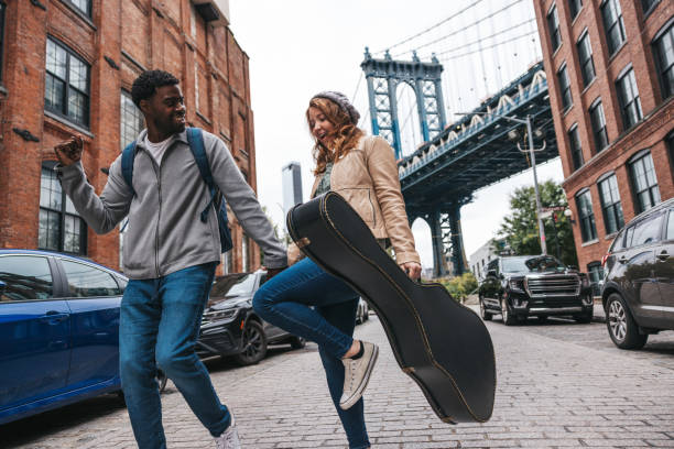 istock Couple walking down the streets discovering New York 1434180481