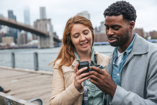 istock Couple enjoying a coffee outdoors 1434180490