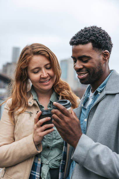 istock Couple enjoying a coffee outdoors 1434180492