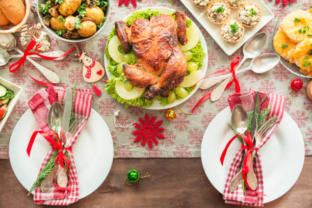 istock Christmas family dining table. Festive table. Table setting. Christmas holidays background . New Year. View from above. 1434181017