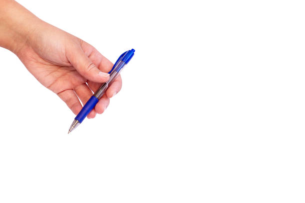 female hand holding a new blue ballpoint pen on a white background