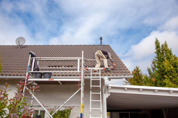 istock Roofer, worker on the roof. Solar Cell Installation. Preparation of Solar panel installation. attaching rails. 1434189574
