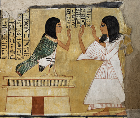 Scene from the tomb of Inherkhau showing him Standing, pays homage to his own Ba-bird perched on his tomb . Luxor .Egypt .