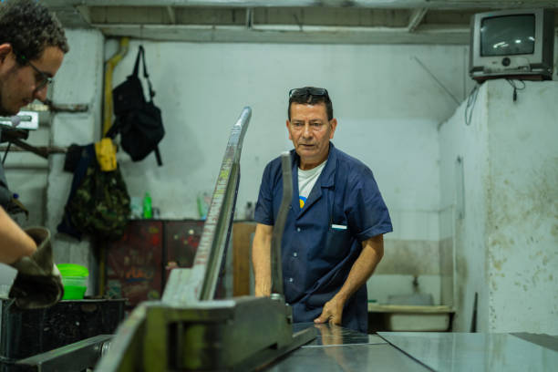 istock Employees of a locksmith are working on cutting material 1434201327