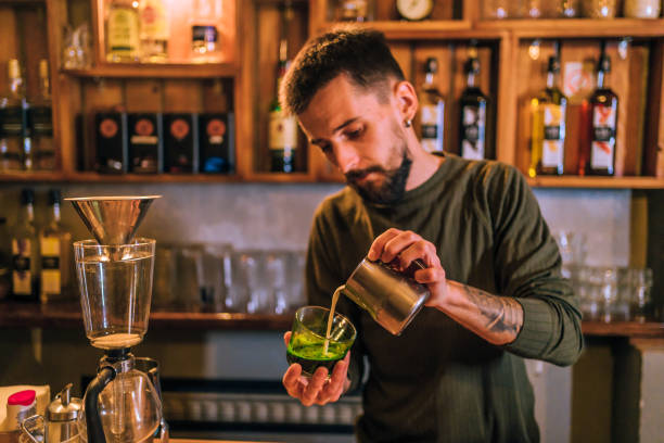 istock Barista preparing green colored coffee 1434204970