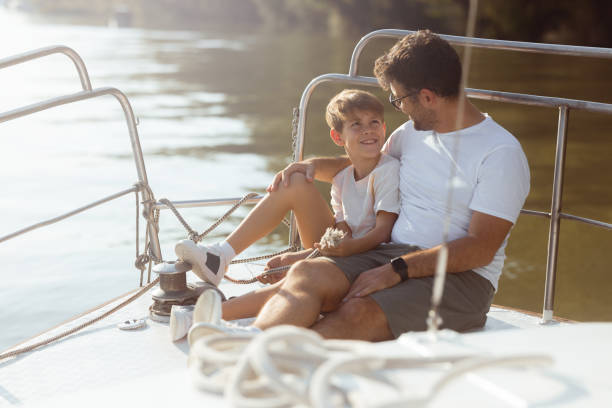 istock Father and son enjoying a day on the water 1434209962