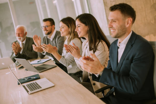 istock Satisfied proud business team clapping hands 1434211840