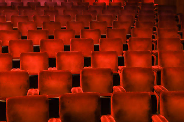 istock Red velvet chairs in a theate 1434211873