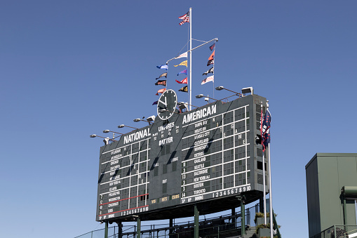 Chicago - Circa October 2022: Chicago Cubs center field scoreboard on the northeast corner of Wrigley field. Wrigley Field has been home to the Cubs since 1916.