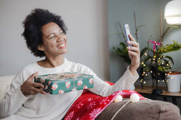 istock Communicating with people on video call during Christmas time 1434218435