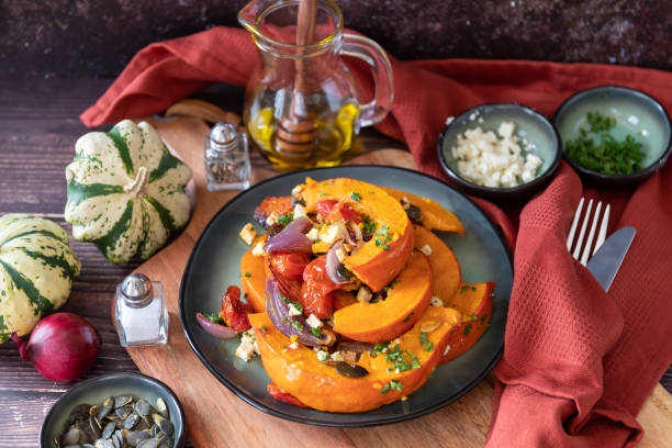 istock Baked hokkaido pumpkin in pieces on a baking tray 1434218890